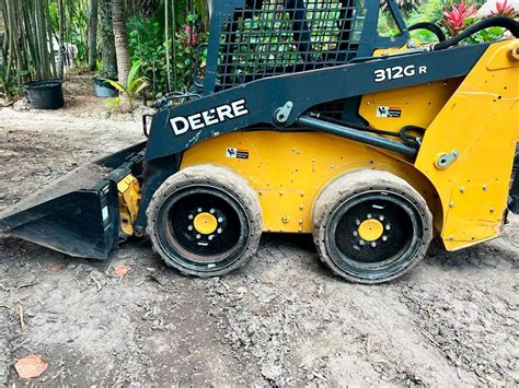 312 john deere skid steer|john deere 312 weight.